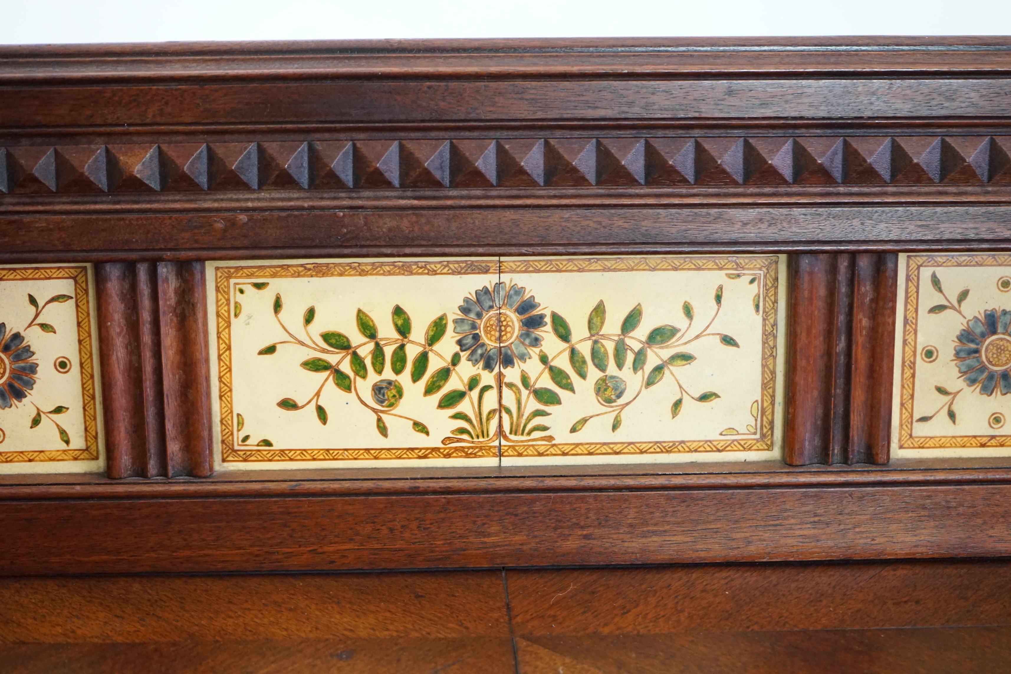 A Victorian Aesthetic Period walnut fall front desk attributed to Bruce James Talbert (1838-1881)